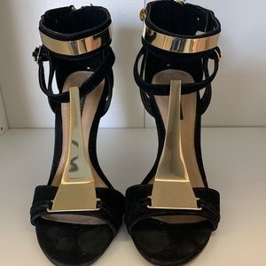 Black and gold dressy heels.